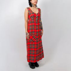 70s red plaid sleeveless maxi dress / xs extra small / red plaid dress / sleeveless pinafore dress / holiday dress / fall plaid dressgood vintage condition - wear from ageempire waistfront pocketsfound in: denver brand: --tag size: -- fits like a modern: xsmodel is 5'3 with measurements of 30x25x35, wears a modern size xs.measurements taken flat:bust - 32inbodice length - 12.5in to shoulder / 5.5in to top of bustwaist - 28inhips -38inlength - 49.5inmaterial: feels like acrylicorigin: --colors: red black green instagram - feverdreamdenver Green Instagram, Red Plaid Dress, Red Black Green, Fall Plaid, Pinafore Dress, Holiday Dress, Sleeveless Maxi Dress, Plaid Dress, Dress Sleeveless