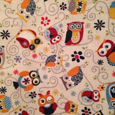 an owl and flower pattern on a white background with red, orange, blue, green, yellow, black, and grey colors