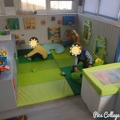 two children playing in a play room with green and yellow floor mats on the walls