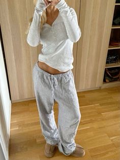 brandy melville grey longsleeve with buttons brandy melville linen low rise pants ultra mini platform brown uggs stockholm style inspo #brandy #brandymelvilleusa #brandymelvilleoutfits #stockholm Sweatpants Outfit Ideas, Brandy Melville Outfits, Uggs Outfit, Toenail Fungus, Winter Mode, Cute Everyday Outfits