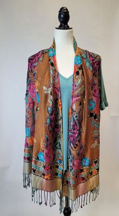 Step up your fashion game in this super-cool brown floral kimono. Lightweight and flowy with fun floral prints, this kimono will instantly make you the life of the party! Be bold and stand out from the crowd. Who needs a basic black cardigan when you can rock this stylish kimono?! 🤩 Brown Open Front Kimono For Spring, Spring Brown Open Front Kimono, Multicolor Shawl Kimono For Spring, Brown Bohemian Kimono For Spring, Bohemian Brown Kimono For Spring, Brown Kimono With Kimono Sleeves For Spring, Stylish Kimono, Life Of The Party, Floral Kimono