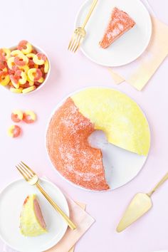 there is a piece of cake on the plate next to other plates and utensils