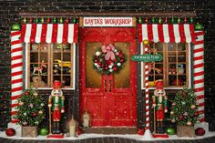 a store front decorated with christmas decorations and wreaths