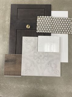 various materials are laid out on top of each other, including paper and wood planks