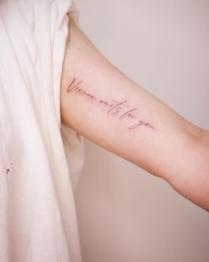 a woman's arm with a tattoo saying, we are the future on it