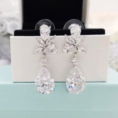 "⚠️⚠️⚠️ PLEASE MAKE SURE TO SEE THE PHOTO TO CHOOSE WHICH MESSAGE CARD NUMBER (#1-30) YOU WOULD LIKE ⚠️⚠️⚠️ SPECIFICATIONS: ♠ For Earrings * Metal Type : Rhodium plated * Material : Cubic Zirconia *Earrings Length : 1 5/16\" (3.4 cm) ♠ Message gift box * There is a white lining cushion behind the message card for added protection of the jewelry. * Box Size :2\" x 3\" * Box color : White, Kraft, Oatmeal, Jade Matte, Blue Ice Gloss, Forest Matte, Red Matte, Orchid Matte, Purple Matte, Navy Matte, White Cubic Zirconia Cluster Earrings For Party, Hypoallergenic Silver Diamond Earrings For Wedding, Hypoallergenic Silver Crystal Earrings For Wedding, Elegant Hypoallergenic Cluster Earrings For Wedding, Hypoallergenic Cubic Zirconia Crystal Earrings For Wedding, Hypoallergenic Cubic Zirconia Wedding Earrings, Silver Hypoallergenic Teardrop Earrings For Wedding, Hypoallergenic Dangle Diamond Earrings For Wedding, Hypoallergenic Cubic Zirconia Bridal Earrings For Wedding