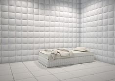 a white bed in a room with square tiles on the wall and floor, 3d rendering