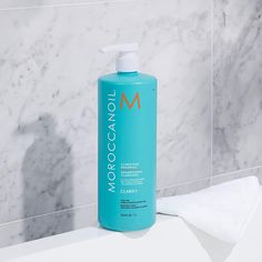 Moroccanoil® Clarifying Shampoo is a deep-cleansing formula that removes everyday buildup, restoring hair to a weightless, healthy balance.  Hair products, hard water and mineral deposits, chlorine and environmental impurities can all leave scalp buildup over time—which can cause dull, greasy or limp hair. What clarifying shampoos do is work to remove the buildup that causes dull, lifeless hair.  FEATURES: Rich in argan and avocado oils, keratin, lavender, chamomile and jojoba extracts. This clarifying shampoo nourishes your hair while gently cleansing impurities away.  Color-safe. Sulfate-free, phosphate-free and paraben-free. Can be used prior to a color, perm or chemical treatment for the most even results. sizes: 8.5 oz. , 33.8 oz.. Packaging may vary based on manufacturer availability Vanity Planet, The Organic Pharmacy, Limp Hair, Keratin Complex, Lifeless Hair, Brazilian Blowout, Pca Skin, Skin Medica, Clarifying Shampoo