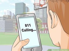 a person holding a cell phone with the text 811 calling on it in front of a basketball hoop