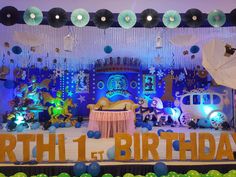 an image of a birthday party setting with balloons and decorations on the stage for children to play in