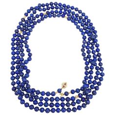 An exquisite, extra long, genuine lapis lazuli bead necklace. Features a single strand of 10mm lapis lazuli beads accented with 14K gold accents and spacers. The 14 karat gold clasp is decorated with two pear-shaped rubies (0.39 total carats) and 14 diamonds (0.11 total carats). An impressive 108 inches around, this can be worn single, double, or triple stranded. This custom made accessory features a hard-to-find clean and classic design, with luxurious quality and craftsmanship to match. Fit fo Long Rope, Gold For Sale, Lapis Lazuli Necklace, Vintage Beads Necklace, Lapis Lazuli Beads, Big Pearl, Turquoise Bead Necklaces, Gold Bead Necklace, Onyx Necklace