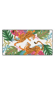 an animal themed placemat with two tigers on it