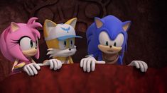 three sonic the hedgehogs looking over a wall