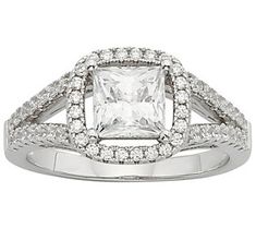 an engagement ring with a princess cut diamond in the center