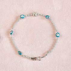 Kibar bir suyoluna eşlik eden nazar boncuklu bu bilekliği, tercih edeceğiniz harfler ile kişiselleştirebilmeniz mümkün.😉💎🧿🔡 It is possible to personalize this bracelet with the evil eye bead, which accompanies a delicate tennis bracelet, with the letters you prefer.😉💎🧿🔡 #mücevher #mücevhertasarım #bileklik #pırlanta #pırlantabileklik #suyolubileklik #finejewelry #bracelet #tennisbracelet #diamondbracelet #diamond #evileye #talisman #minimalstyle #minimalist #oneofakind #trendsetter Symbolic Adjustable Bracelets With Lobster Clasp, Symbolic Adjustable Bracelet With Lobster Clasp, Bracelet Evil Eye, Letter Bracelet, Feb 2, Enamel Bracelet, Initial Bracelet, Eye Bracelet, Evil Eye Bracelet