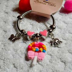 Kids Charm Bracelet - Stainless Steel (Popsicle) - $15 - Nwt. Fun Adjustable Pink Charm Bracelet, Adjustable Pink Charm Bracelet Fun Style, Pink Adjustable Bracelet For Playtime, Adjustable Pink Bracelets For Playtime, Adjustable Pink Bracelet For Playtime, Fun Pink Charm Bracelet, Playful Pink Nickel-free Bracelets, Cute Pink Hypoallergenic Charm Bracelet, Pink Cute Hypoallergenic Charm Bracelet