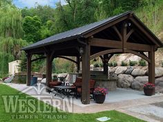 a gazebo in the middle of a grassy area