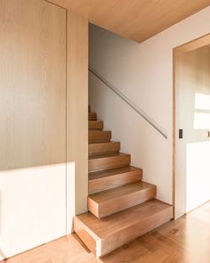 there is a wooden stair case in the house