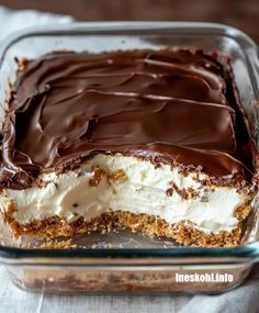 a chocolate and cream dessert in a glass dish