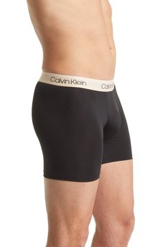 A stylish logo waistband brands sleek boxer briefs cut from a silky, ultra-comfortable microfiber fabric. Pack of three pairs No fly 88% polyester, 12% elastane Machine wash, tumble dry Imported Men's Clothing Stylish Logo, Black Olive, Boxer Briefs, Briefs, Men's Clothing, Low Rise, Calvin Klein, Sleek, Nordstrom