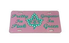 a pink license plate that says pretty, gorgeous in pink and green