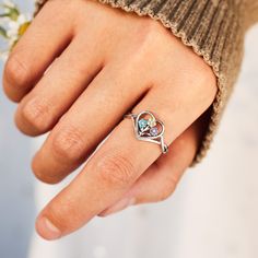 This personalized Flower Heart Ring is a perfect gift for mom, grandma, family, friend, or just anyone who wants a reminder of their loved ones! It's fun to choose the colored stones to represent all of the ones you care about. Multicolor Heart-shaped Ring For Gift, Multicolor Heart Ring For Valentine's Day, Heart-shaped Multicolor Promise Ring, Valentine's Day Heart-shaped Birthstone Ring, Multicolor Heart Promise Ring For Valentine's Day, Valentine's Day Adjustable Heart Birthstone Ring, Adjustable Heart-shaped Birthstone Ring For Valentine's Day, Heart-shaped Gemstone Rings For Mother's Day, Heart Shaped Gemstone Rings For Mother's Day