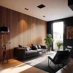 a living room filled with furniture next to a large open window and wooden paneled walls