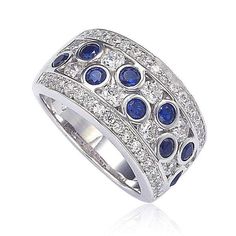 From the caribbean blues collection, this ring flaunts modern chicfrom every angle, featuring natural blue sapphires (1.34 ct) andcreated white sapphires (2.41 ct) with a natural fancy browndiamond (.02 ct) hand set in sterling silver with a unique designerSuzy Levian gallery and 18K gold Suzy Levian logo. This ring is designed bySuzy Levian with a message. By creating jewelry that is beautifulinside and out, Suzy Levian's message is revealed through herhidden brown diamond set in the shank of t