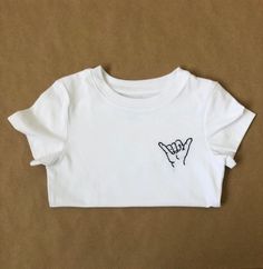 Treat your little surfer babe to this custom Surfs Up tee! Hand embroidered and made with love. Add your little one's name to make it extra special. Any questions please message me. I LOVE doing custom pieces :) Returns and Exchanges: I do not accept returns on personalized pieces but will be happy to discuss any issues via messages. All tees are Cat and Jack brand. Sizing runs true. If in between sizing please go up as they do shrink slightly in washing machine. Thanks for visiting Sweet Olive White Casual Tops With Custom Embroidery, Basic Cotton Tops With Custom Embroidery And Relaxed Fit, White Casual Top With Custom Embroidery, Basic Relaxed Fit Top With Custom Embroidery, Casual Fitted Top With Custom Embroidery, Trendy White T-shirt With Custom Embroidery, White Embroidered Basic Top, Fitted Tops With Custom Embroidery And Short Sleeves, Fitted Short Sleeve Tops With Custom Embroidery