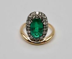 Introducing our dazzling Oval Emerald Donut Ring! This beauty features a vibrant 2.75 carat lab grown oval emerald, hugged by a halo of pave lab grown diamonds in a blackened setting, creating a delightful donut effect. Set atop an 18K yellow gold band, it's a playful twist on classic elegance. Flaunt your unique style with this eye-catching ring that's sure to turn heads! Arielle Ratner Emerald Pave Perch RingLab Grown Gems: Our lab grown stones are not synthetic, or treated. These are 100% sap Arielle Ratner, Donut Ring, Columbian Emeralds, Brooch Jewelry, Classic Elegance, Lab Diamonds, Ring Bracelet, Gold Bands, Lab Grown