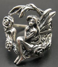 Sterling silver ring 925/1000, fairy and flower. Stamped 925. Approximate weight 8.5 grams. Top width 2.4cm. All our jewels are made from solid sterling silver 925/1000 and are carefully crafted by hand in our family workshop. We dispatch your orders in 5 working days, worldwide and the postage is $5. We ship registered priority mail. Please allow 5-7 working days for delivery in Europe and 10-15 working days outside Europe. For any questions - please do not hesitate to contact me! Fairy Accessories, Romantic Rings, Silver Dog, Handmade Sterling Silver Rings, Jewelry Mens, Cameo Ring, Flower Rose, Funky Jewelry, Fantasy Jewelry