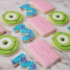 decorated cookies with numbers and monsters on them