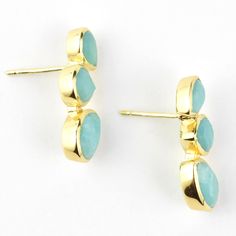 Handmade in Turkey Brass with 22k gold overlay Three teardrop shaped amazonite Earrings measure about .75" long Click HERE to see more jewelry from AJS Design ABOUT GOLDMAKERS JEWELRY Goldmakers Jewelry creates and curates a comprehensive selection of artfully designed hand-crafted jewelry. We aspire to offer the jewelry enthusiast access to affordable classics as well as fresh innovative designs. Turquoise Teardrop Amazonite Jewelry, Faceted Turquoise Teardrop Earrings, Gold Teardrop Chandelier Clip-on Earrings, Turquoise Teardrop Faceted Earrings, Handmade 14k Gold-filled Teardrop Chandelier Earrings, Ring Icon, Amazonite Earrings, Chevron Earrings, Chevron Necklace