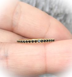 "- BLACK DIAMOND 3/4th Eternity Pave Band/ Anniversary Band/ Wedding Band/ Stackable Ring/ Matching Wedding Band MaterialGold (14K & 18K) or PLATINUM 950 FinishingHigh Polished/ Shiny PlatingRhodium (only if WHITE gold) FitComfort/ Rounded Interior Width1.6 mm Height1.6 mm SettingU Micro Pave Set (Reminds the Letter \"U\" from sides) StonesGenuine Diamonds ColorBlack QualityAAA Total Caratapx 0.40 This ring is full of elegance and beauty! It is so simple and so complete at the same time! One Black Round Eternity Band For Anniversary, Black Eternity Band For Anniversary, Elegant Black Bands Suitable For Gifts, Elegant Black Bands For Gifts, Elegant Black Bands For Anniversary, Elegant Black Anniversary Bands, Black Stackable Round Cut Rings, Black Stackable Rings For Anniversary, Black Stackable Rings With Round Band