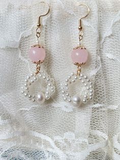 Sold as a pair. complete with pink crystal , real pearl and Abs resin. Please note they are made with natural pearl , they won't be perfect, and each earring is different, though we do try to match them. R E T U R N   P O L I C Y  No return for earrings due to hygiene reason. Cheap Pink Pearl Earrings As Gift, Cheap Pink Pearl Earrings For Gift, Feminine Pearl Drop Jewelry, Rose Gold Jewelry With Pearl Drop, Rose Gold Pearl Drop Jewelry, Handmade Delicate Pearl Earrings, Feminine Silver Jewelry With Pearl Drop, Silver Pearl Drop Feminine Jewelry, Cute Round Jewelry For Party