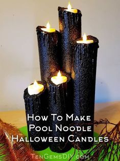 four black candles sitting on top of a green plate with the words how to make pool noodle halloween candles