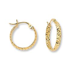 These versatile hoop earrings for her are textured with a diamond-cut pattern. The earrings are fashioned in 14K yellow gold and secure with hinged backs. Elegant Textured Yellow Gold Jewelry, Formal Textured Yellow Gold Jewelry, Textured Yellow Gold Round Hoop Earrings, Textured Yellow Gold Hoop Earrings, Textured 14k Yellow Gold Jewelry, Elegant Textured Jewelry For Anniversary, Textured Small Hoop Yellow Gold Earrings, Textured Gold Jewelry For Anniversary, Textured Yellow Gold Round Jewelry