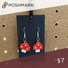 Mushroom perler bead earrings Perler Bead Patterns Jewelry, Small Mushroom Perler Bead Patterns, Mini Mushroom Perler, Iron Bead Earrings, Earring Perler Beads, Pearled Bead Earrings, Pearler Bead Earrings Diy, Pyssla Earrings, Fuse Beads Earrings