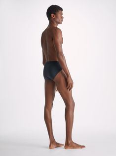 Our mid-height brief has a closed front for a clean and classic look. We chose a super-soft binding to finish the hems; all part of our quest for a minimalist streamlined look and the ultimate in softness and comfort. Crafted from a unique blend of 92% pima cotton and 8% elastane for added stretch, they're the perfect feel-good choice for sleeping, lounging and day-to-day wear. The model is 6'2" / 189cm tall. He wears a size Medium. Sleek Second-skin Solid Bottoms, Classic Seamless No-show Bottoms, Sleek Second-skin Bottoms With Smoothing Detail, Classic Soft Touch Bottoms, Sleek Second-skin Smoothing Bottoms, Modern Bottoms With Smoothing High-cut Leg, Modern Seamless High-cut Leg Bottoms, Classic Stretch Bottoms With Moderate Coverage, Modern Fitted Brief Bottoms