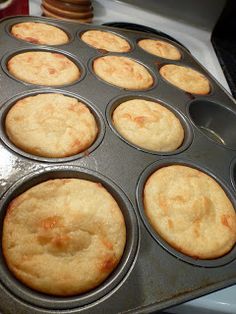 a muffin tin filled with freshly baked cornbreads