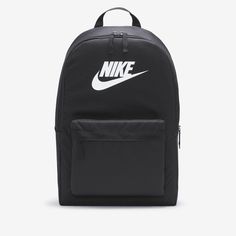 Take your gear to go with the Nike Heritage Backpack. Its spacious main compartment features a sleeve that holds up to a 15" laptop, so your computer is never out of reach. 2 zippered accessories pockets help keep your gear organized and easy to grab. This product is made with at least 65% recycled polyester fibers. Black Nike Backpack, Nike Heritage Backpack, Mochila Nike, Nike Backpack, Nike Looks, White Backpack, Nike Bags, Unisex Backpack, Heritage Backpack