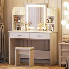 a white vanity with lights on it and a stool in front of the mirror that is lit up