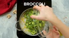 broccoli being prepared in a food processor