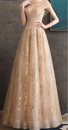 $134.90 Gold Sequined Princess Evening Dress. It is sexy, comfy and classy. This gown is made of a thick fabric. This gown is perfect for balls and formal evenings. It will show your feminity and elegance. It is good for elegant ladies and seductive women. Gold Ball Gown Dresses For Banquet, Gold Sequin Dress For Prom Season, Gold Floor-length Ball Gown For Party, Elegant Gold Sequin Dress For Prom, Gold Ball Gown For Party, Gold Sequined Gown For Prom, Gold Gown For Banquet And Prom Season, Gold Maxi Length Gown For Prom, Gold Maxi Gown For Prom