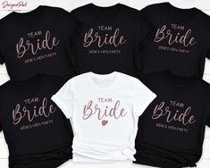 four bride shirts with the words team bride in pink and white on them, sitting next to each other