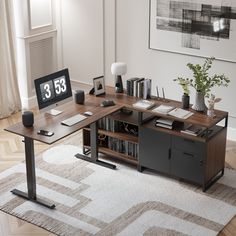 a computer desk with a clock on top of it