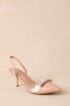 Embrace a touch of elegance with these Beige Slingback Kitten Heels. Perfect for any occasion, the sleek design and comfortable lift will elevate your outfit (literally!). Step into style and walk with confidence. These beige kitten heels feature a pointed toe, delicate bow detailing, a strap around the back the foot, clear siding for extra support, and a short heel. Heel Measures 3" in Height All Man Made Materials Imported True To Size Beige Kitten, Slingback Kitten Heels, Short Heels, Bow Detail, Sleek Design, Red Dress, Kitten Heels, Siding, Sleek