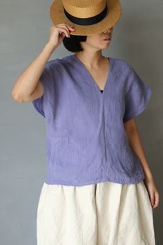 SASAKI-CHIHO(Antique fabric) "Antique linen short sleeves V-neck blouse"  Handmade by Chiho Sasaki Material:Antique linens, from France. Color:Over-dyed,ly purple. Size: Neck to cuff : 9.8 inch (25 cm) Chest measurement :41.7 inch(106 cm) Shoulder to hem: 21.2 inch (54 cm) Model:5'2"(157 cm) Thank you Antique Fabrics, Blouse Sleeveless, Purple Blouse, Antique Linens, Linen Short, French Antique, V Neck Blouse, Traditional Design, Light Purple