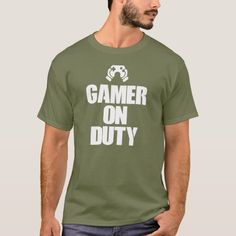 a man wearing a t - shirt that says gamer on duty