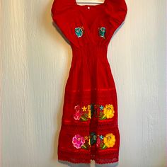 Brand New Mexican Dress. Never Worn. A Little Too Small For Me. Stretchy Could Fit Extra Small To Small Person. Cinched Waist. No Flowers On The Back Of Dress. Can Be Worn Over The Shoulders. Beautiful Bright Colors. Red Sleeveless Dress For Fiesta, Red Summer Dress For Fiesta, Casual Fitted Dresses For Fiesta, Mexican Dress, Multi Colored Flowers, Flowers Color, New Mexican, Mexican Dresses, Colored Flowers